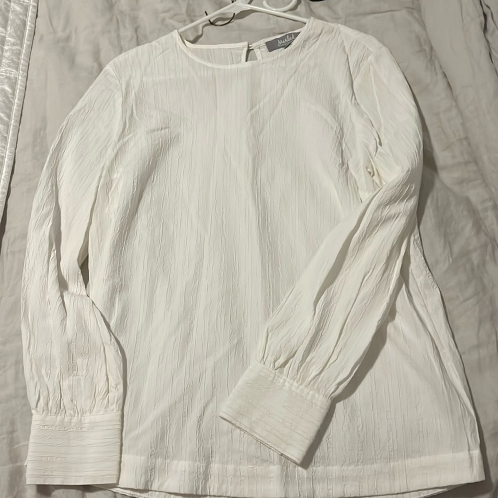 Crisp white blouse.